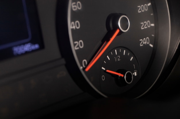 Close up on fuel level gauge in vehicle