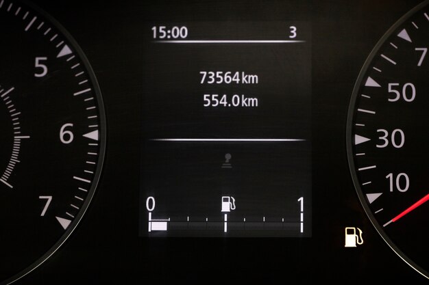 Close up on fuel level gauge in vehicle