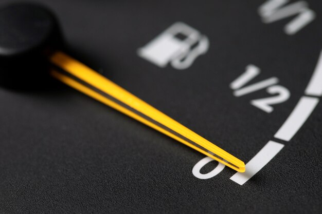 Close up on fuel level gauge in vehicle