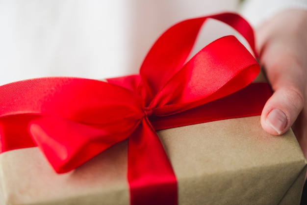 Close-up gift box in hands