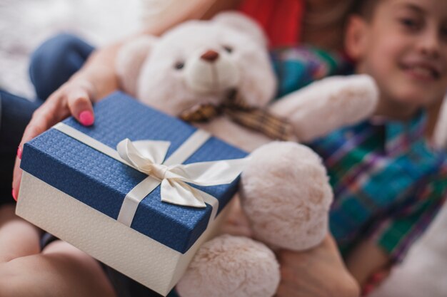 Close-up of gift and teddy bear