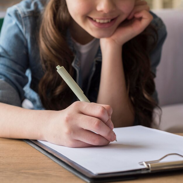 Close-up girl drawing