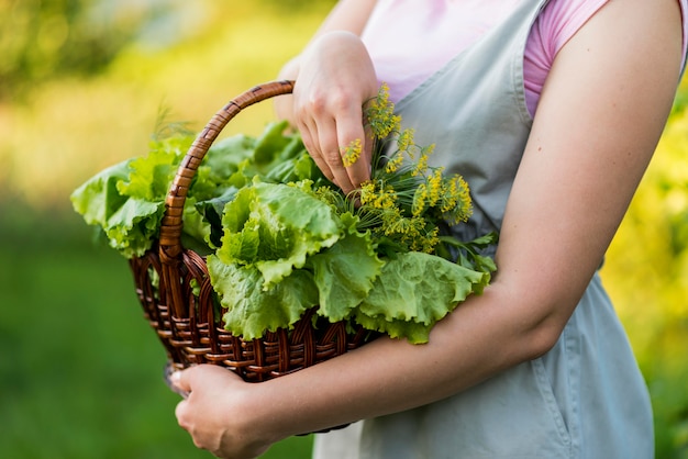 Close-up girl holding basket