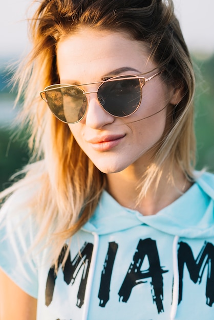 Free photo close up of girl posing on rooftop