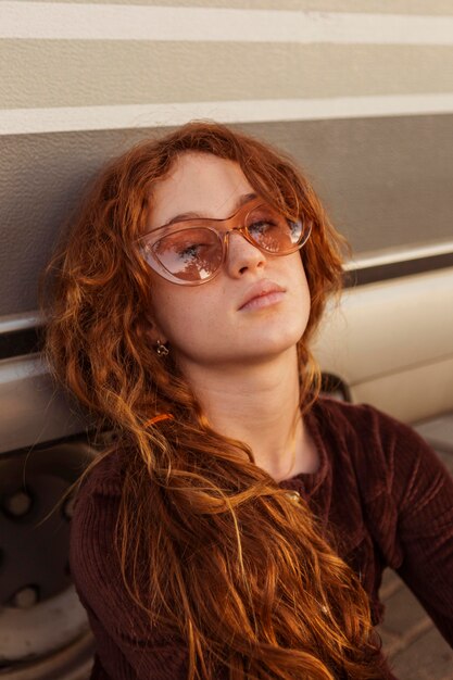 Close-up girl posing with sunglasses