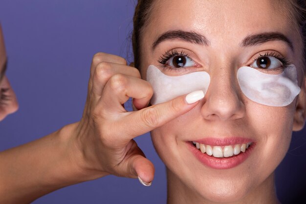 Close-up girl receiving skin care treatment