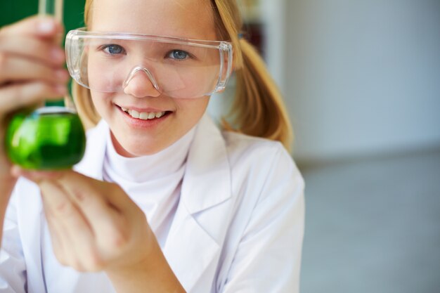 Close-up of girl smiling with her project