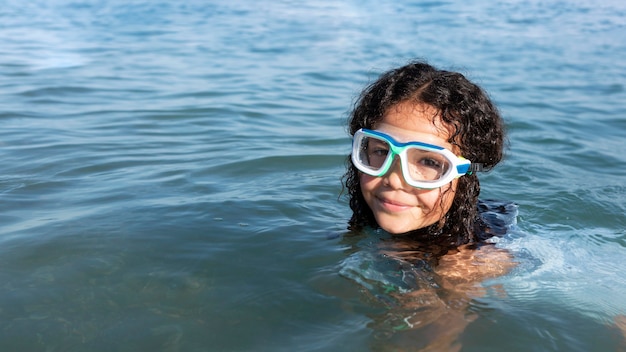 Close up girl swimming