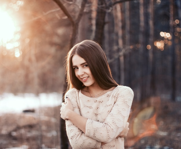 Close-up of girl in winter forest