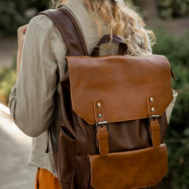 Close-up girl with vintage backpack