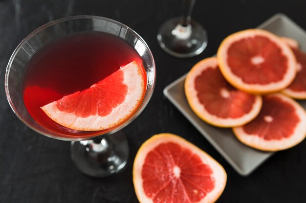 Close-up of glass of grapefruit cocktail