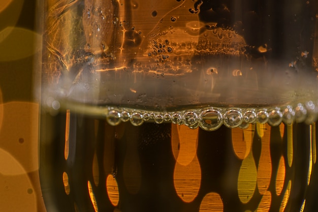 Free photo close-up glass with champagne on new year night