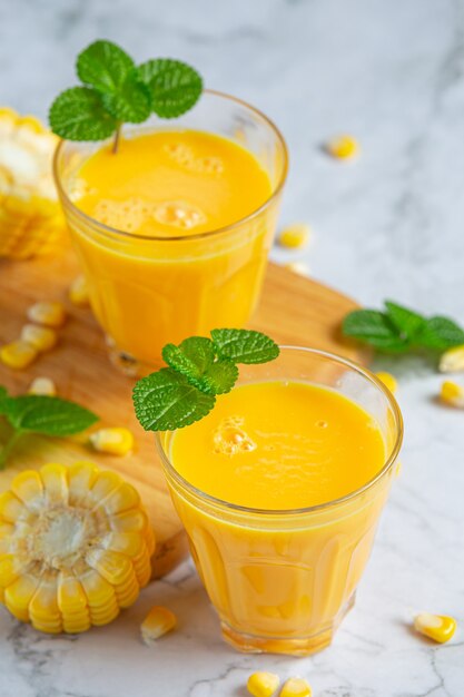 Close up on glasses of corn juice ready to eat