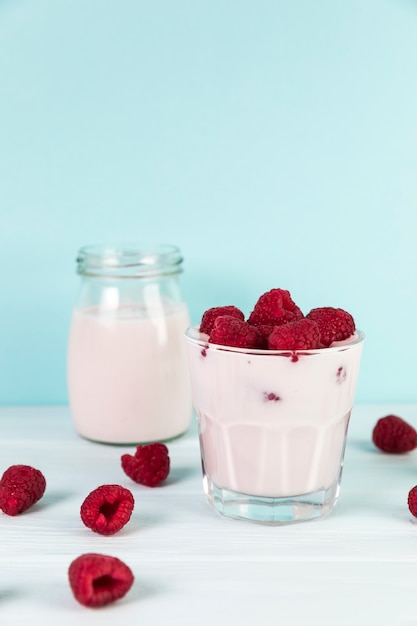 Close up glasses with homemade raspberry milkshake