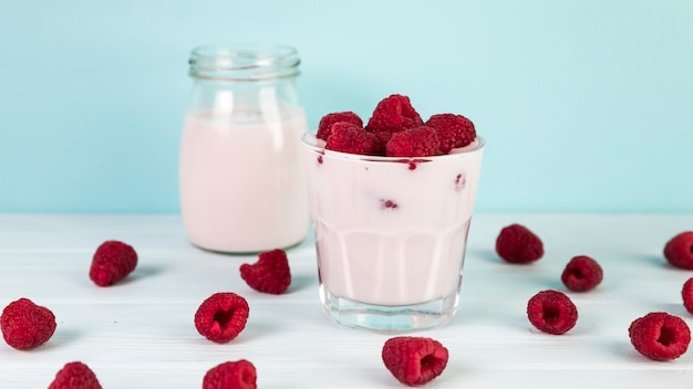 Close up glasses with homemade raspberry milkshake