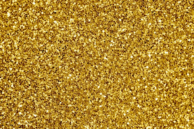 Close up of golden glitter textured background