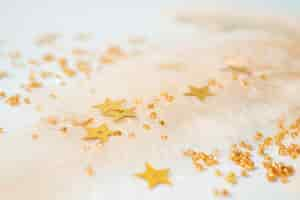 Free photo close up on golden sparks and glitter