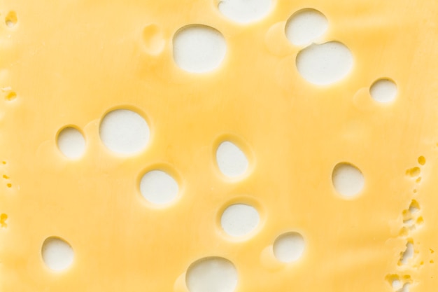 Free photo close-up gourmet emmental cheese slice