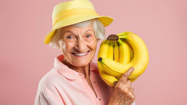 Foto gratuita close up sulla nonna con le banane