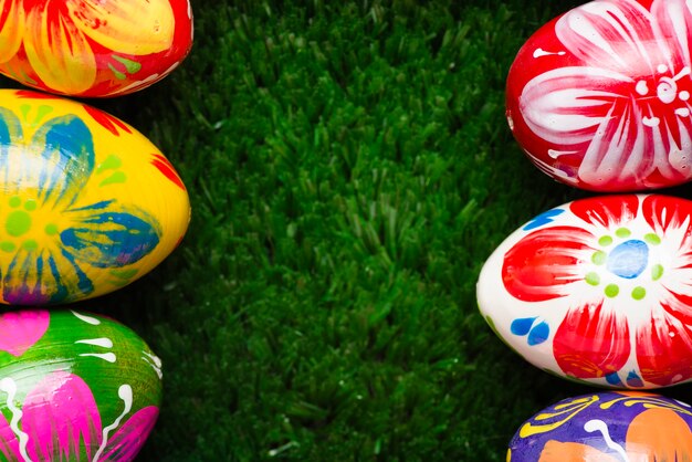 Close-up of grass surface with easter eggs