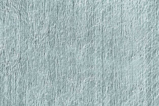 Close up of a green scratched concrete wall texture