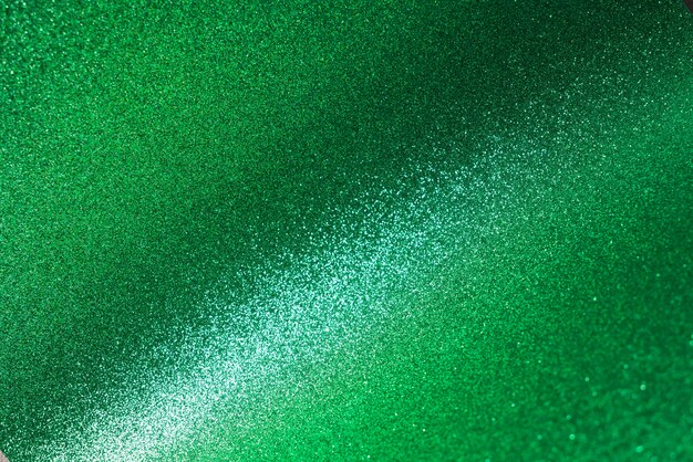 Close up on green sparks and glitter