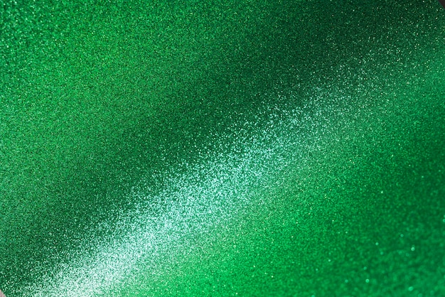 Close up on green sparks and glitter