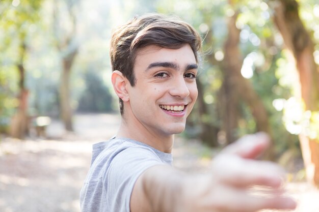 Close-up of guy enjoying yoga exercises