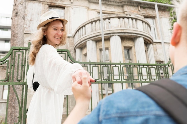 Close-up guy holding girlfriend hand