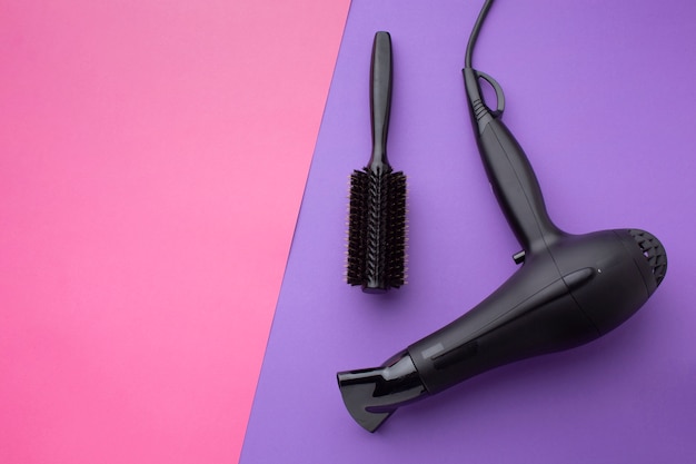 Close up of hair dryer and brush