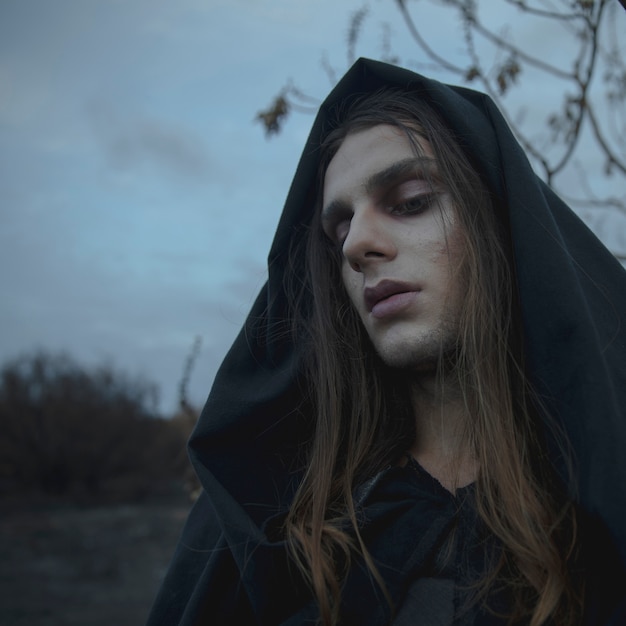 Free photo close-up of halloween masculine model looking away