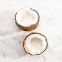 Free photo close-up halves of coconut fruit