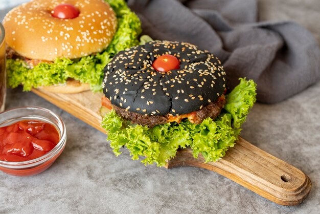 Close-up hamburgers on cutting board