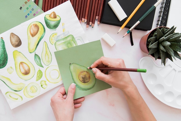 Free photo close-up hand drawing fruit