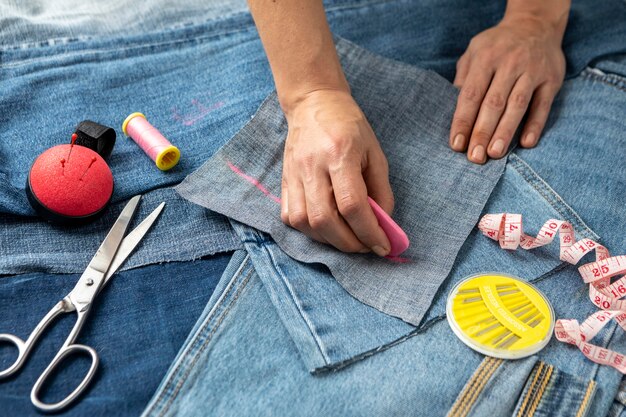 Close-up hand drawing jeans piece