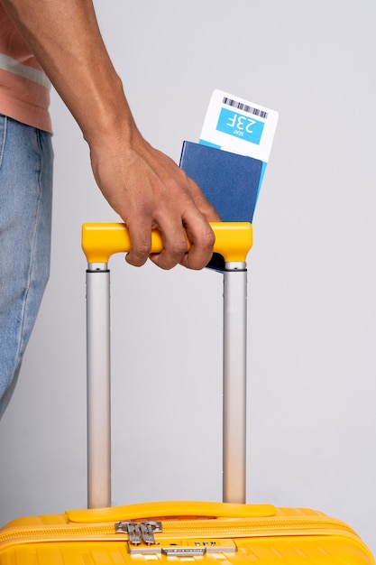 Free photo close up hand holding baggage