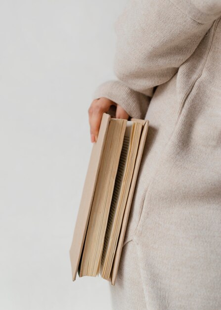 Close up hand holding book