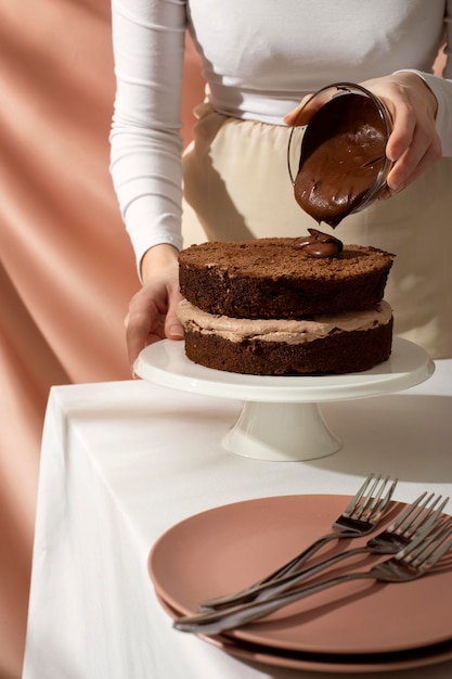 Close up hand holding bowl with topping