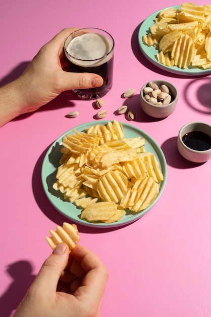 Free photo close up hand holding chips