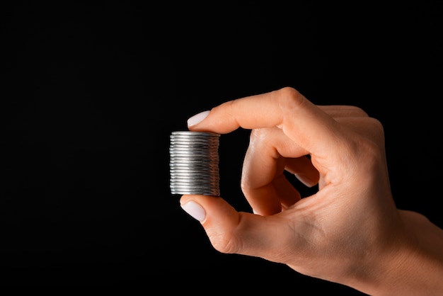 Free photo close up on hand holding dollar coins