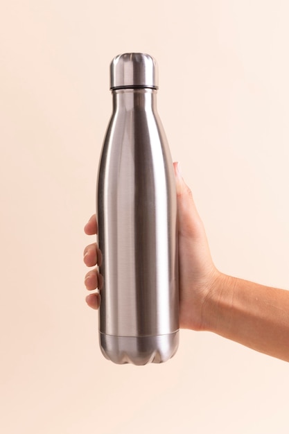 Close-up hand holding flask