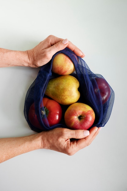 Free photo close up on hand holding food