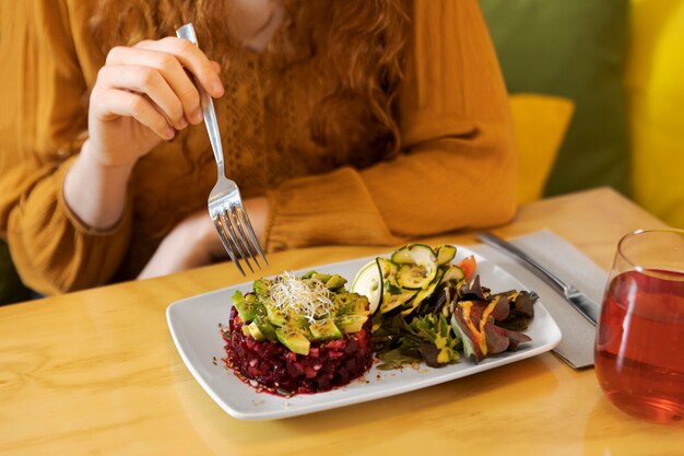 Close up hand holding fork