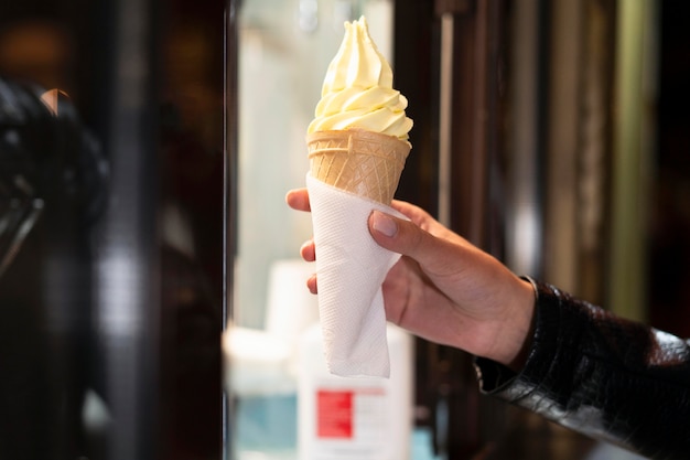 Close up hand holding ice cream