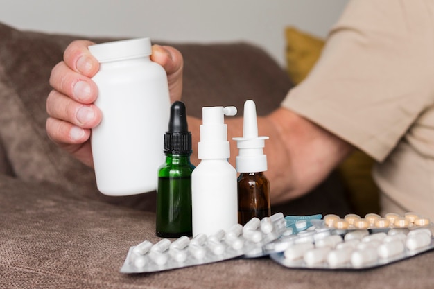 Close-up hand holding medicine