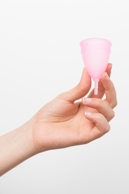 Free photo close up hand holding menstrual cup