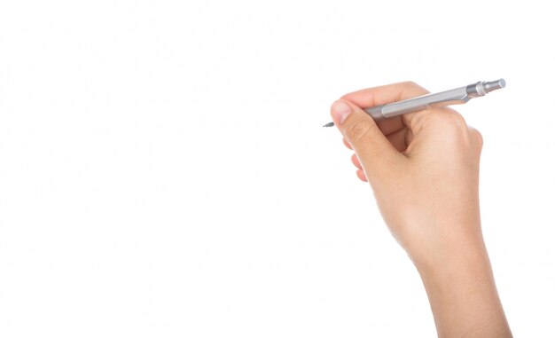 Close-up of hand holding a pen to write