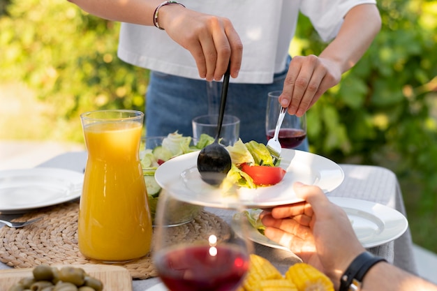 Free photo close up hand holding plate