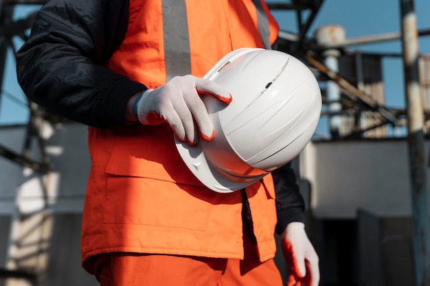 Close up hand holding safety helmet