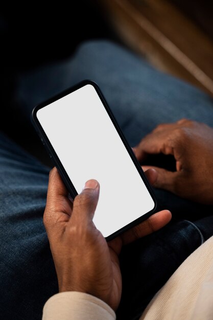 Close up hand holding smartphone